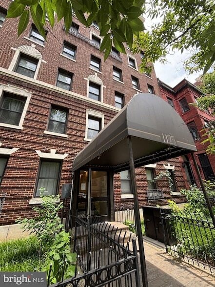 Building Photo - 1125 12th St NW Unit 54