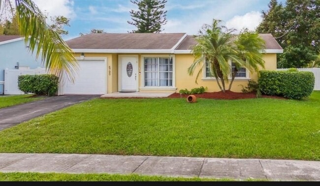 Building Photo - 6790 NW 24th Ct