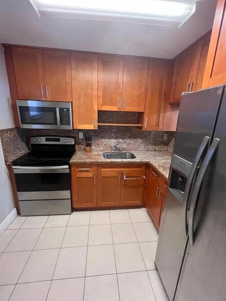 Building Photo - 11307 SW 200th St Unit 313B