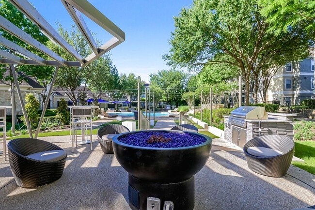 Outdoor Entertaining Space with Cozy Fireside Feature. - Franciscan of Arlington