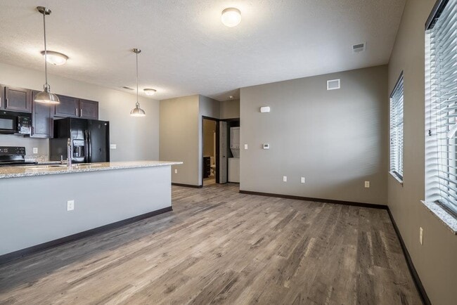 Sleek finishes, durable flooring, and an open layout make it easy to design a space that fits your lifestyle. - North Pointe Villas