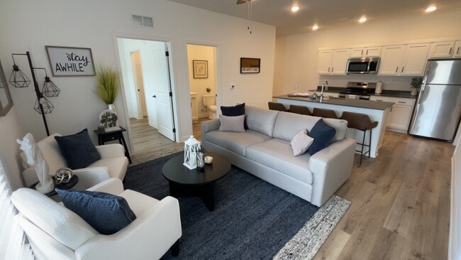 Living Room and Guest Bed/Bath - Gated Villa Apartments at Kearney