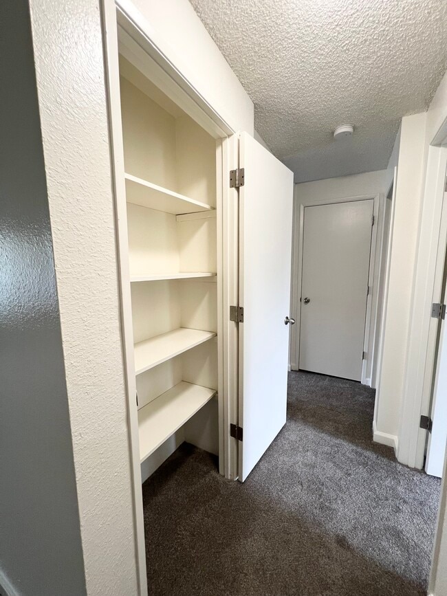 1x1 Standard- Hall/Linen Closet - Sunset Ridge Apartments