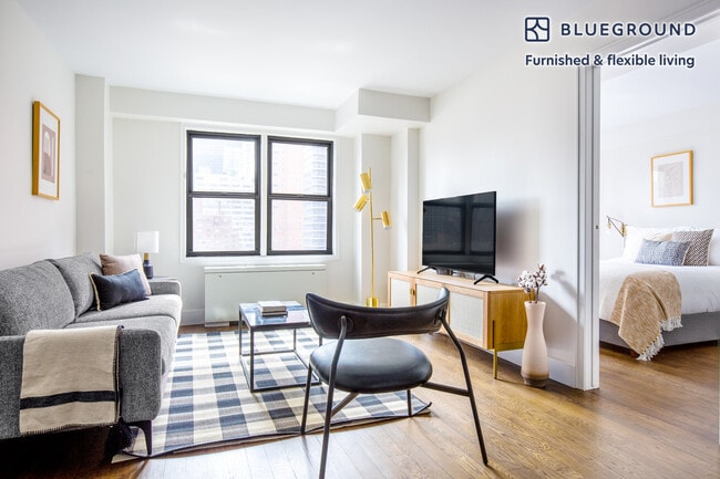 Building Photo - 220 E 63rd St Unit FL9-ID566