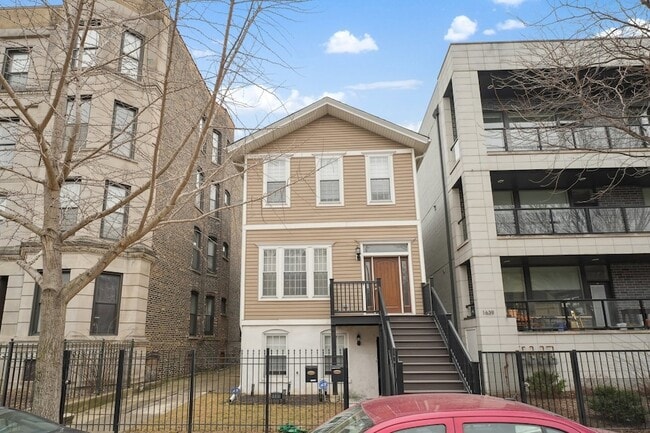 Building Photo - 1635 W Warren Blvd Unit 1