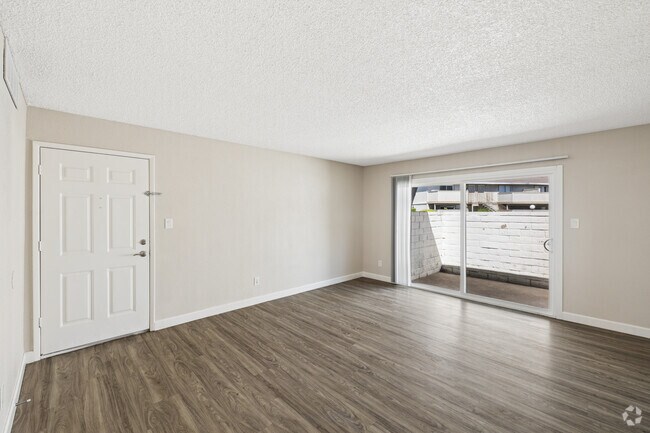 2BR, 1BA - 625SF - Living Room - Sierra Square