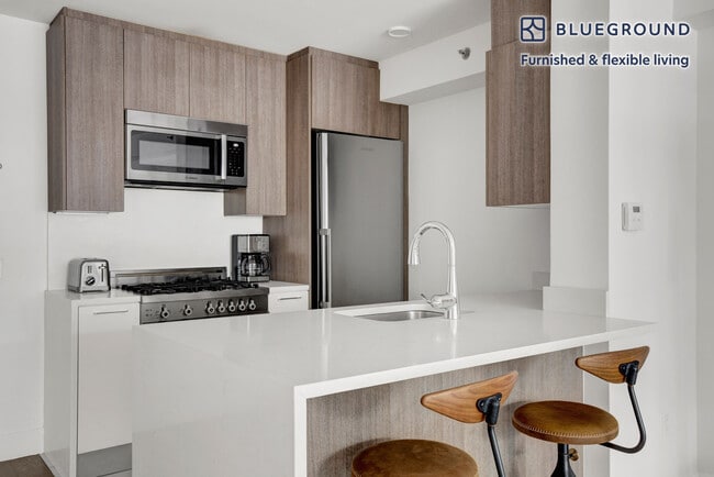 Photo - 311 W 50th St Unit FL2-ID692