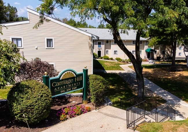 CARRIAGE HILL APARTMENTS - Carriage Hill Apartments