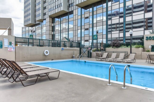 Dive into relaxation at Pennsylvania Place Apartments! Enjoy our inviting pool, perfect for sunny days and unwinding after work. With modern amenities and stylish surroundings, make this your ideal home. Schedule your visit today! - Pennsylvania Place Apartments