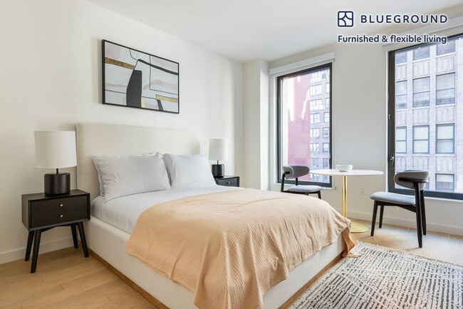 Building Photo - 244 W 29th St Unit FL6-ID2141