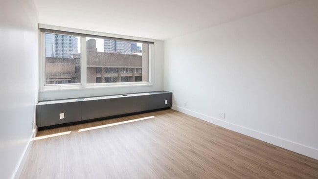 Bedroom with Hard Surface Flooring - The Towers at Longfellow
