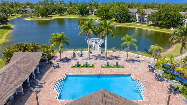 Soak up the sun by the pool or relax on the scenic dock—life at Grand Oaks blends luxury with laid-back lakefront charm. - Grand Oaks At The Lake