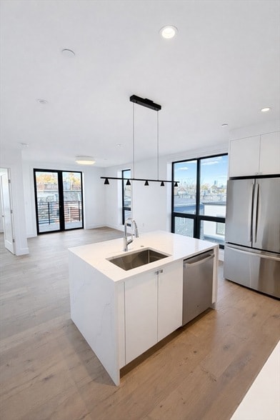 Building Photo - 1121 Dorchester Ave Unit 205