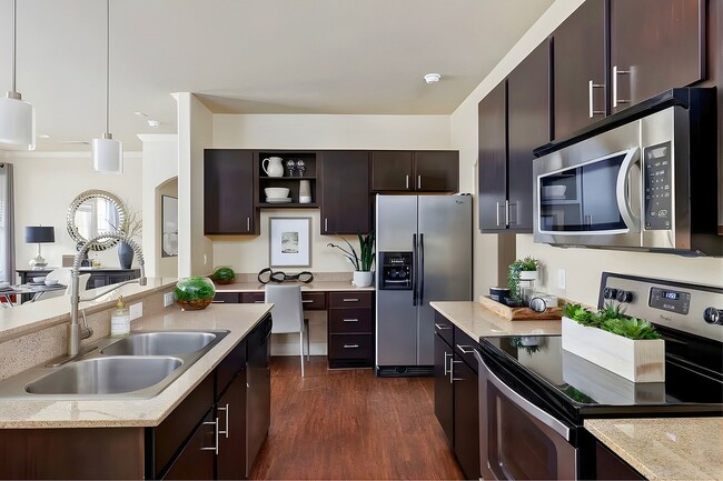 Model Kitchen with Stainless Steel Appliances - Ladera Apartment Homes