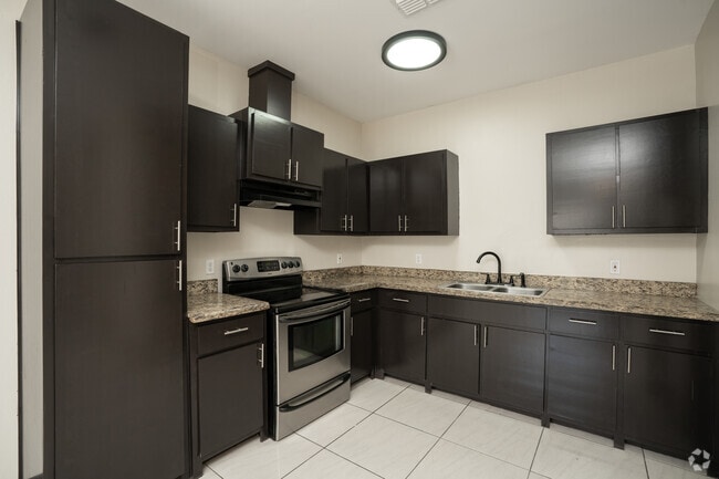 3BR, 2BA - 1,095SF - Kitchen - Rebeca Apartments