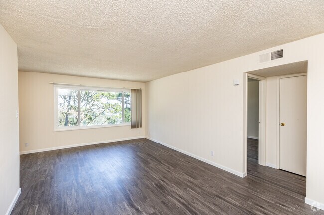 1BR, 1BA - 766SF - Living Room - Terrace View