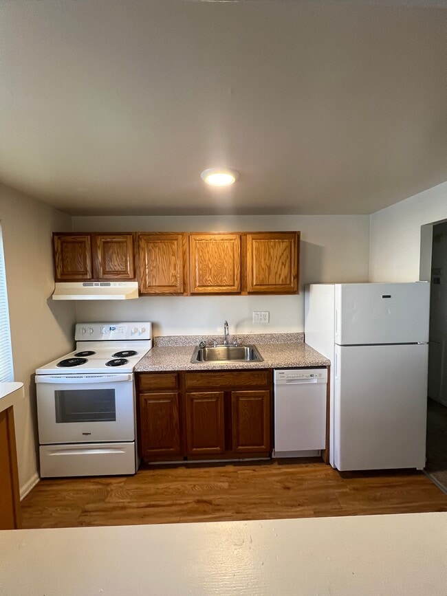 Kitchen 2nd view - Arrowhead Court Apartments