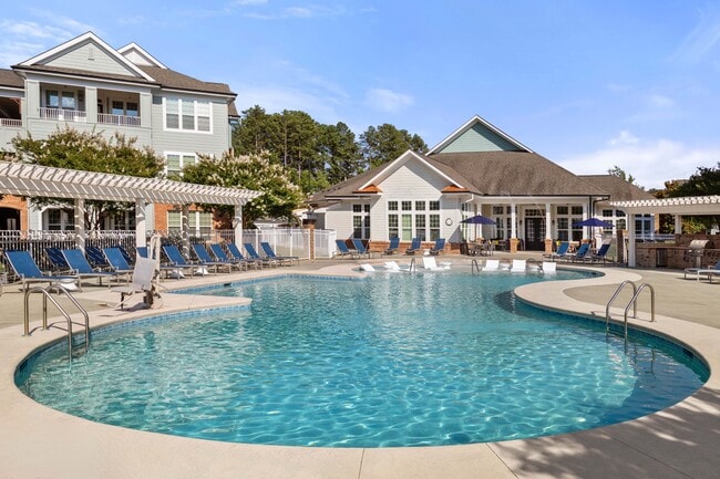 Cool off with a refreshing swim steps from home - Villages at Pecan Grove
