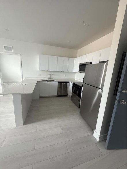 Photo - 1091 E 17th St Unit 301