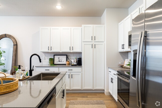 3BR, 2.5BA - 1,580SF - Kitchen - Drexler Townhomes at Holbrook Farms