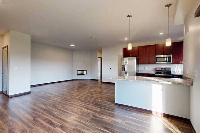 Open-concept living that flows effortlessly from kitchen to lounge, perfect for relaxing or entertaining. - 360 at Jordan West