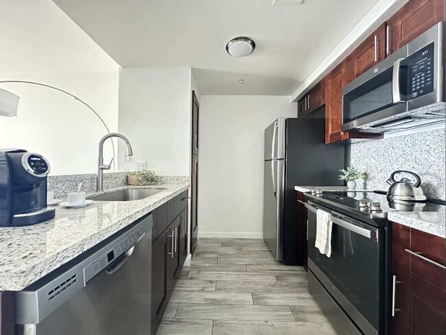 Photo - 2889 McFarlane Rd Unit ID1240705P