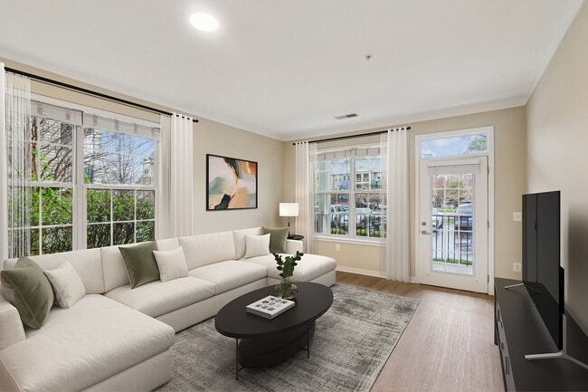 Updated Finishes living room with new hard surface flooring - Avalon Falls Church