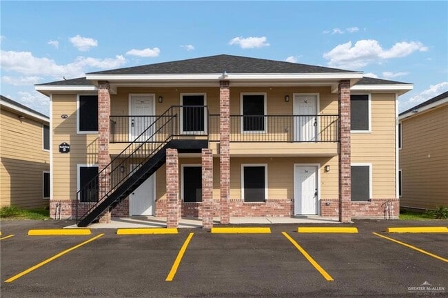 Building Photo - 1426 E Rogers Rd Unit 33
