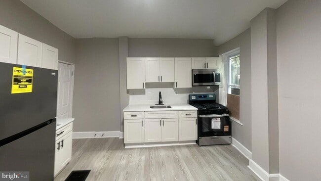 Building Photo - 6152 Glenmore Ave