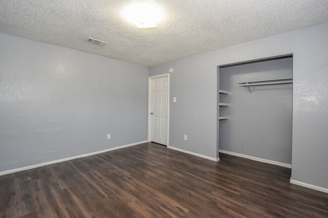 1 bed, 1 Bath - Spacious Bedroom - Coral Manor Apartments