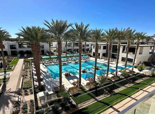 Building Photo - 6587 N Palmeraie Blvd Unit 1042