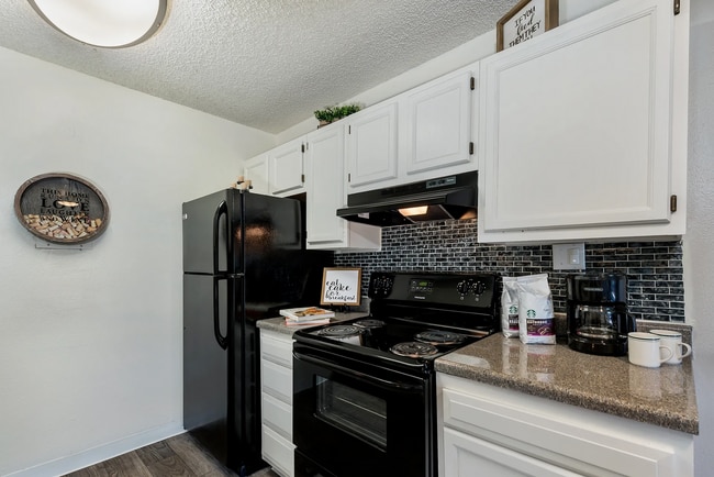 Kitchen w/ White Cabinetry - Florida Station