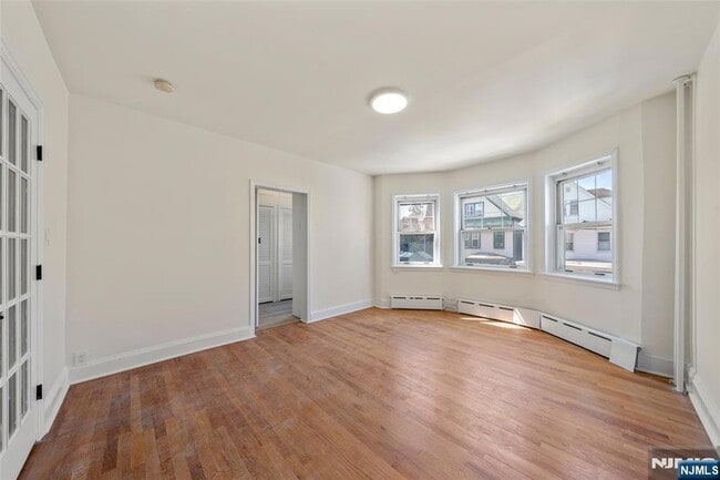 Building Photo - 8 Cooper Pl Unit 2