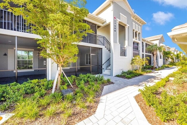 Building Photo - 17500 Opal Sand Dr Unit 204