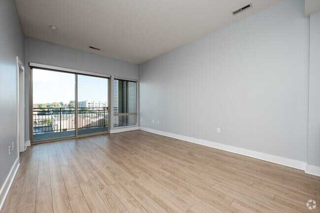 Lily - 1BR, 2BA - 1,000SF - Living Room - The E'Laan