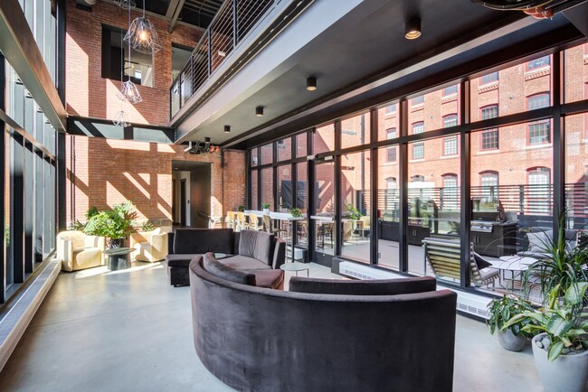 Floor to ceiling glass connector - Windsor Radio Factory