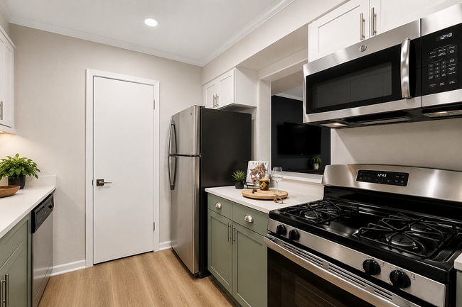Modern apartment kitchens with stylish finishes and everyday functionality. - Avana Cumberland