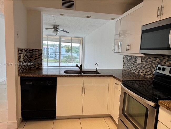 Photo - 1831 Sabal Palm Dr Unit 403