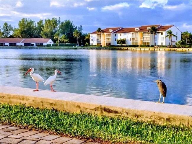 Building Photo - 4436 NE Ocean Blvd Unit 100E2