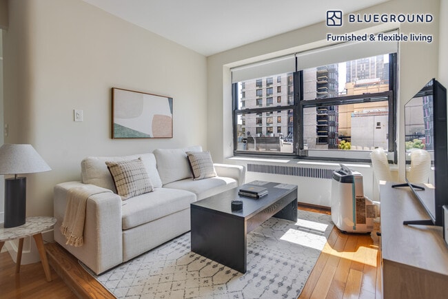 Building Photo - 252 E 61st St Unit SI FL5-ID2256