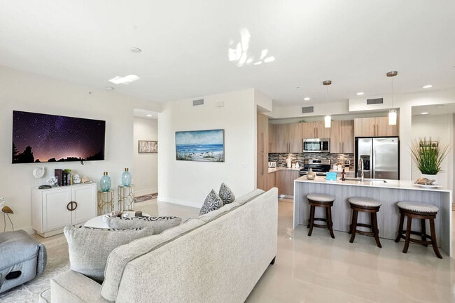 Building Photo - 15773 Beachcomber Ave Unit FL3-ID1295146P