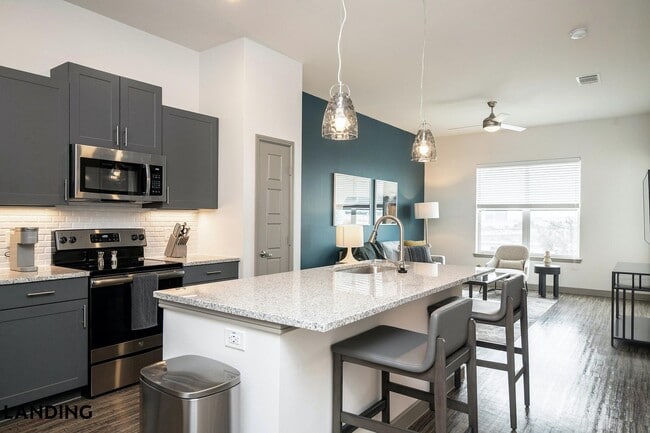 Building Photo - 6525 Ed Bluestein Blvd Unit 7208