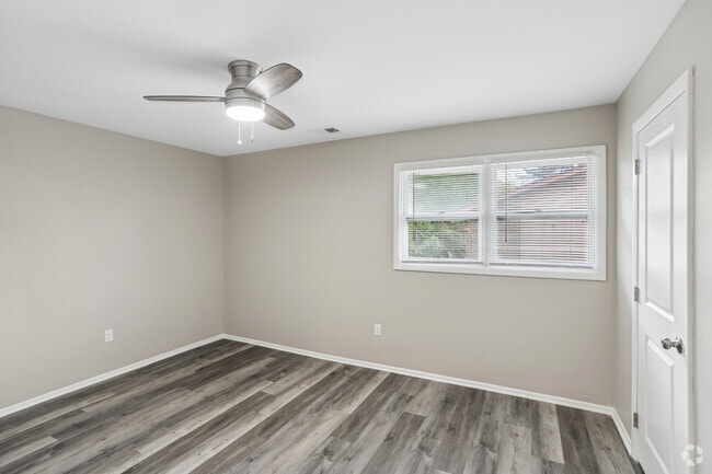 2BR, 1BA - 770SF - Primary Bedroom - Woodside Village Apartments
