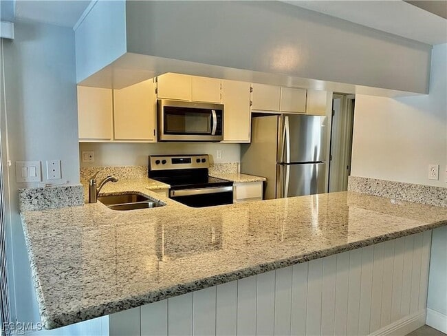 Photo - 5650 Trailwinds Dr Unit 122