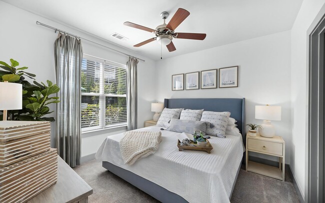 Spacious Bedroom with Ceiling Fan and Plush Carpeting - The Landing at Vinnin Square