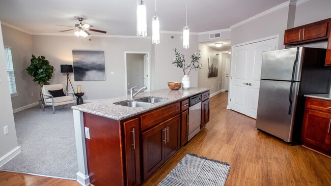 Revel in spacious living with our open-concept floor plans, filled with natural light from large windows, creating an inviting and serene atmosphere. - Rowan Park