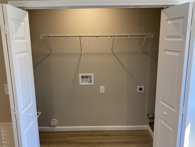 laundry closet off kitchen - Pleasant View Apartments on Carroll Creek