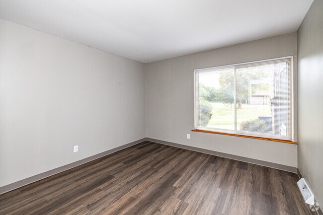 2BR, 2BA - 1,100SF - Living Room - American Colony
