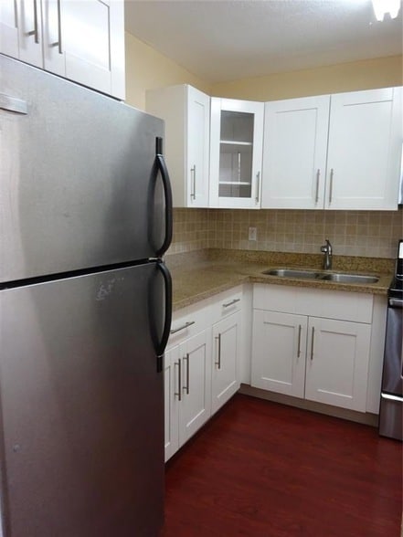 Building Photo - 6050 NW 64th Ave Unit 307