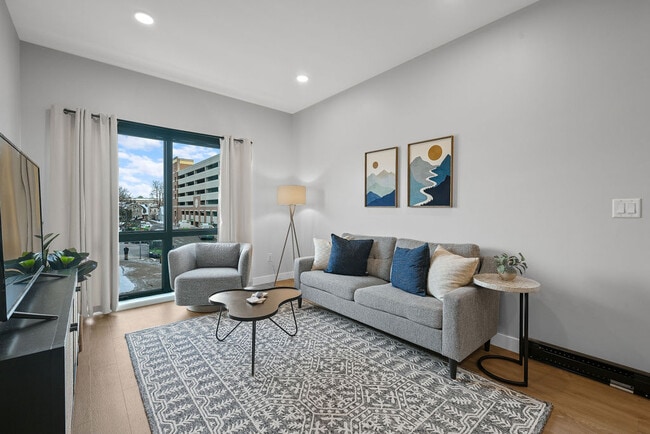 Furnished Living Room - Urbane115 Apartments